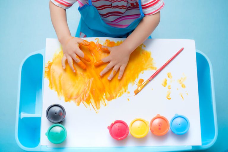A child drawing using hands